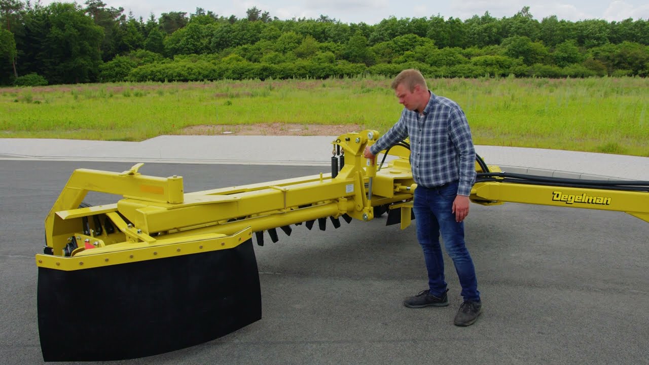 Degelman Rock Rake RR1500 Steinschwader am John Deere 4755