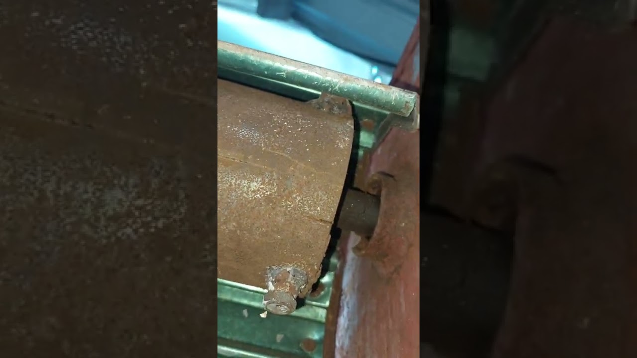 reparación de la cortina de acero enrollable con su mecanismo de cadena