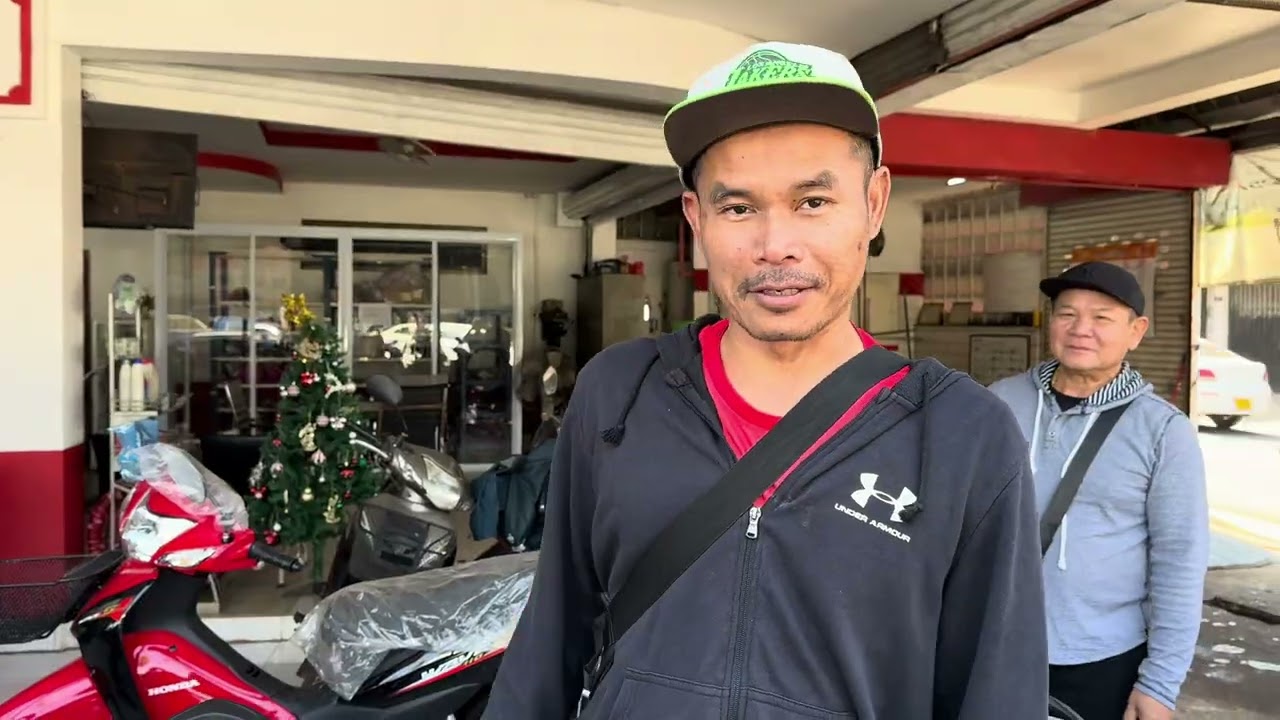 Take Konbannok to go buy his first motorcycle in Laos …ພາ Konbannok ໄປຊື້ລົດຈັກ