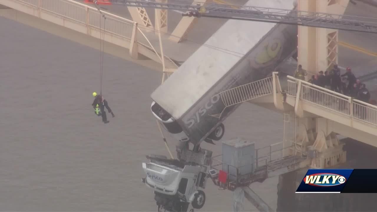 Louisville firefighter Bryce Carden recounts intense semi truck rescue over Ohio River