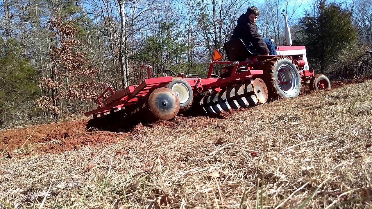 Discing with a custom built Cub cadet 124