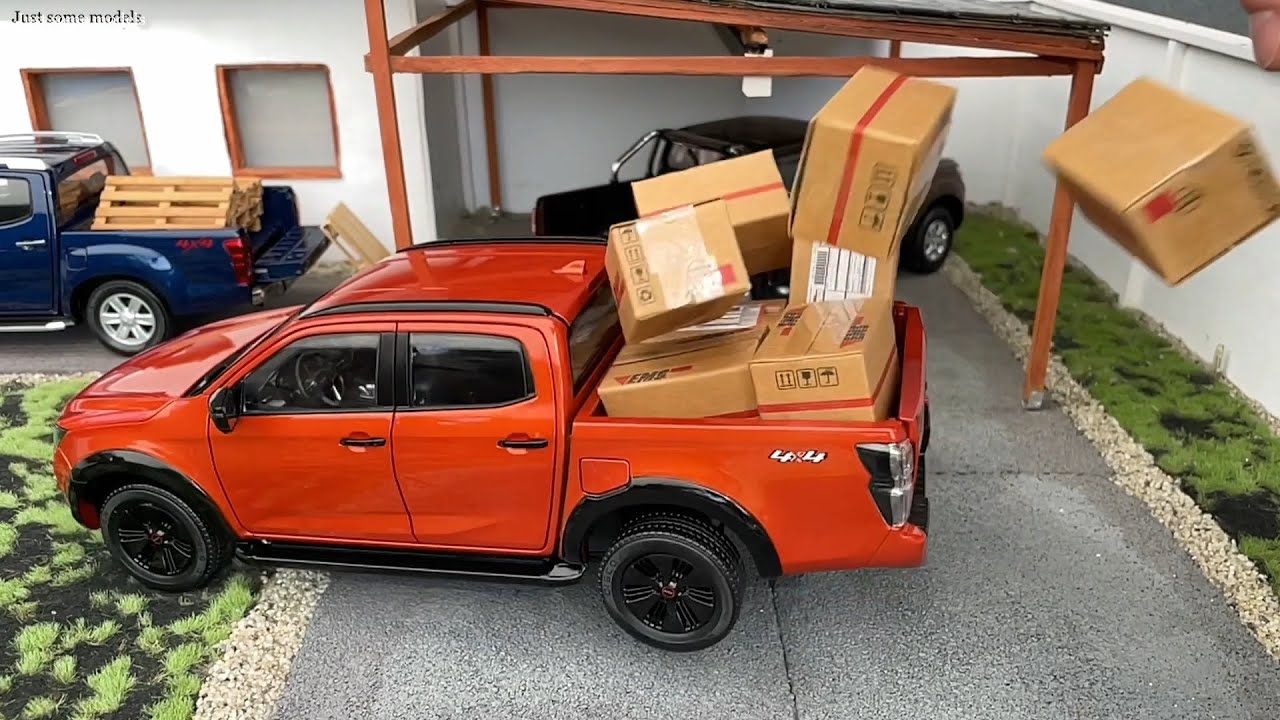 1:18 Isuzu D-Max 3.0 Ddi V-Cross 2023, Valencia orange - Paudi [Unboxing]