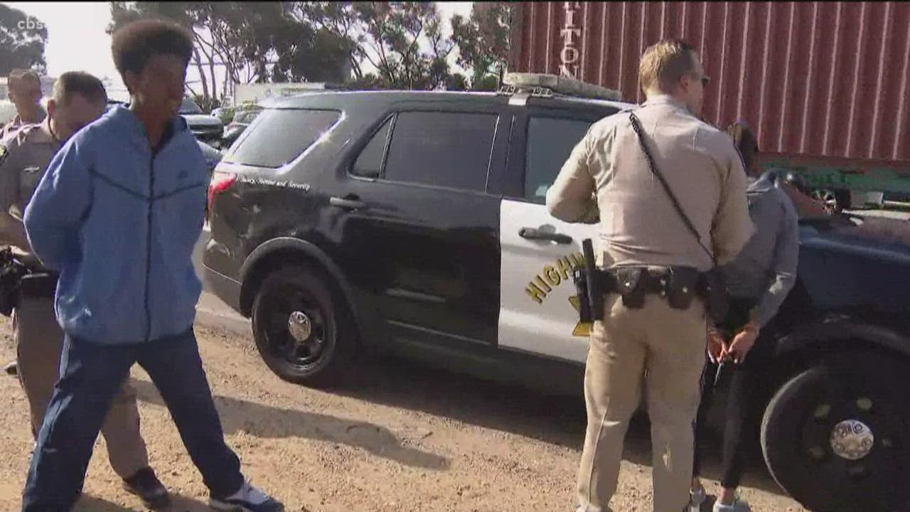 Arrests made after traffic incident with armored vehicle sends cash flying on I-5