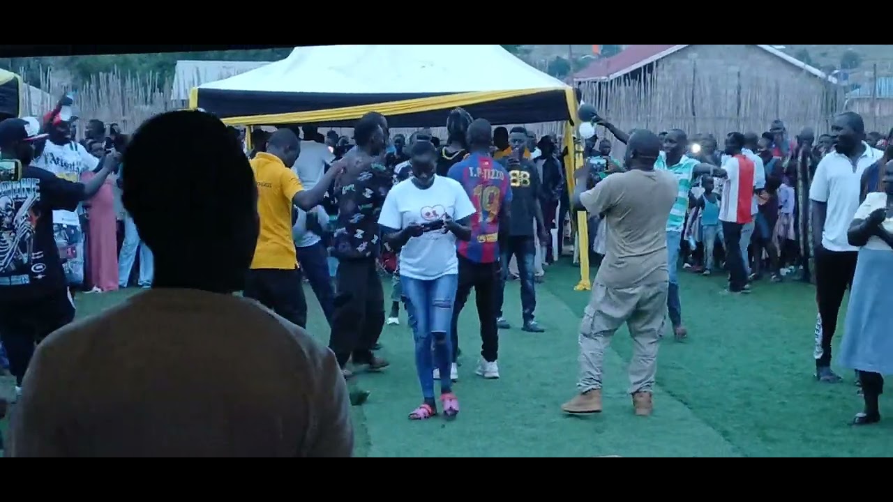 AK-16 De Son Welcome AK Ricky ov Madi HomaBoyz at Kita Nyöi FC Trophy Celebration. 