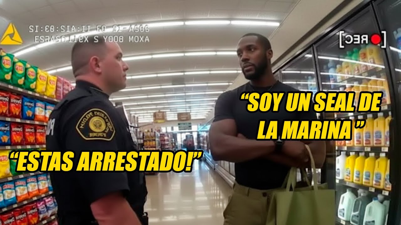 El policía asalta a un SEAL negro de la marina en la tienda - La cámara de seguridad lo expone