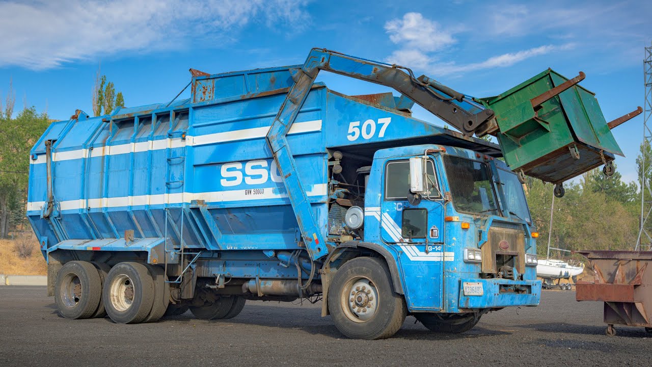 1987 Peterbilt 310 -  Amrep Octagonal Front Load Garbage Truck