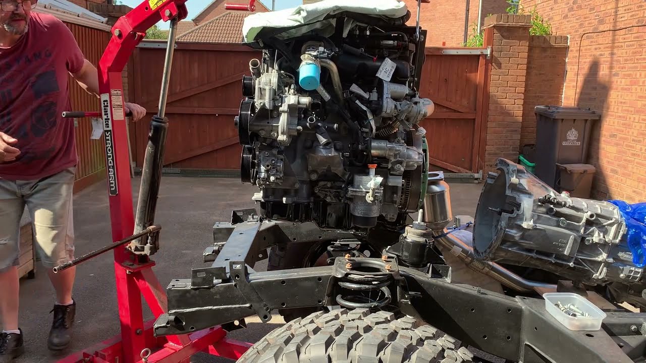 Fitting the LOF clutch, Allisport downpipe and getting the Engine in.
