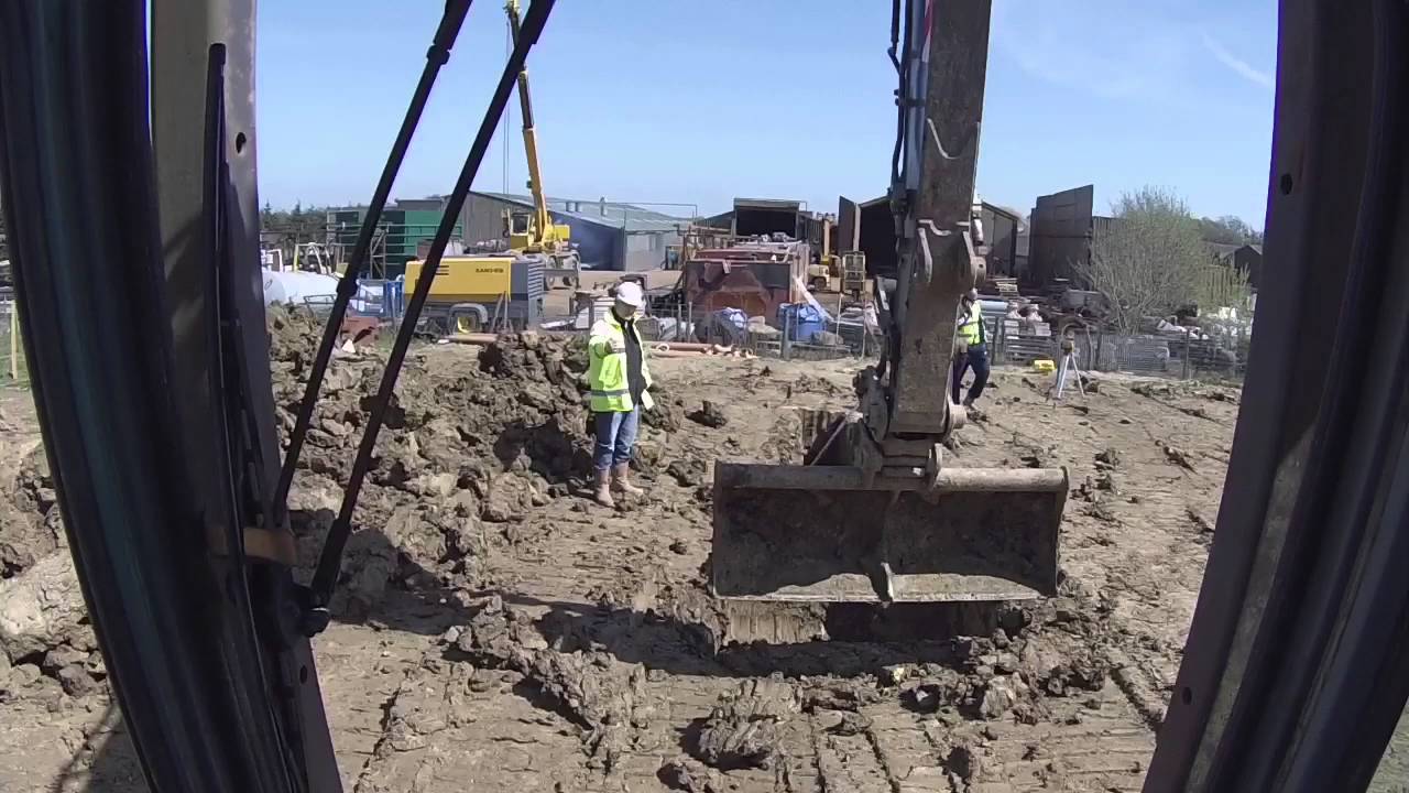 CPCS 360 excavator above 10 tonnes mock trench with man hole.