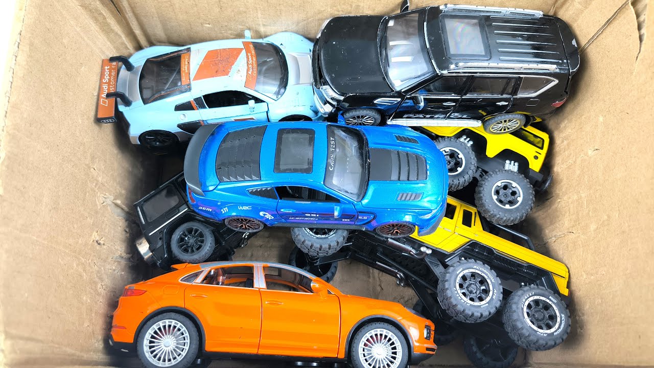 Box Full of Model Cars -Mazda Mx5, Koenigesgg Jesko, Lamborghini Scv12, Byd Yang Wang U8, Toyota Car