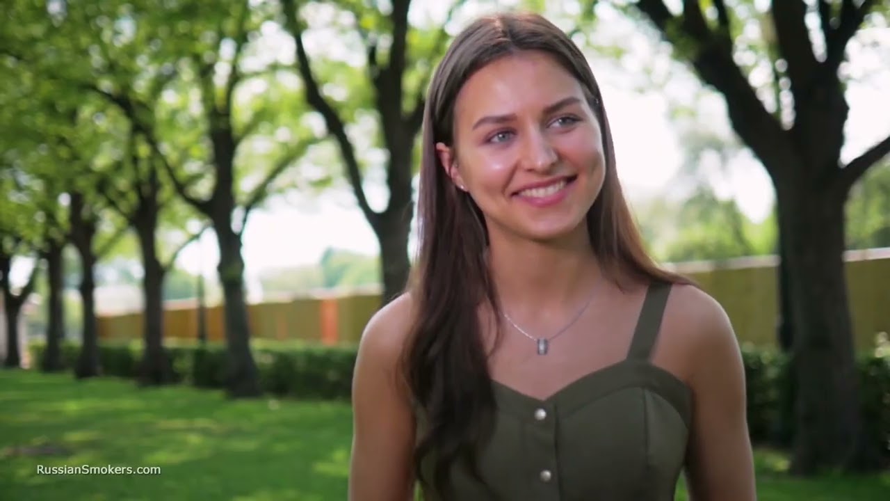 Pretty russian girl Christine talking and smoking 120mm in the park