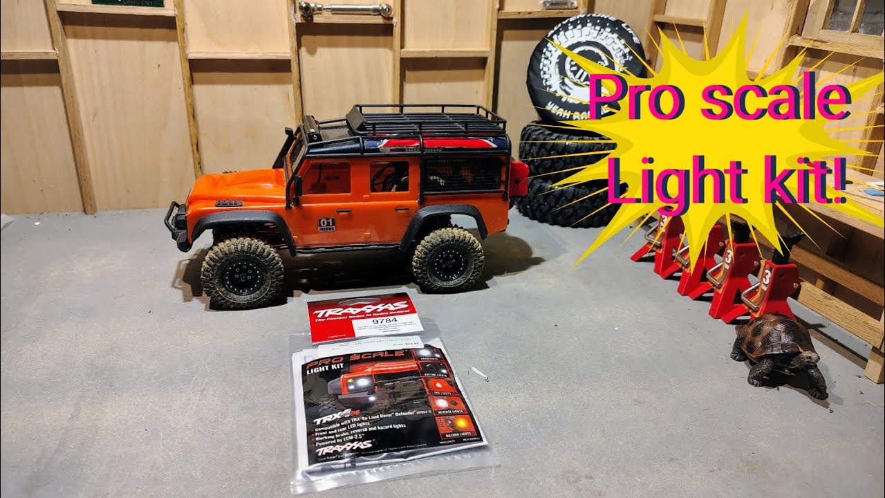 Trx4m defender getting the Traxxas pro scale light kit installed and testing!