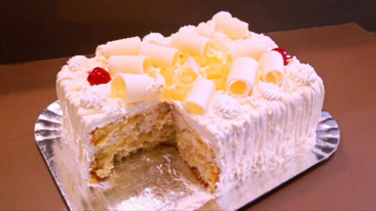 Bolo de festa do ZERO: ABACAXI Trufado com Mousse Branca, mais vendido, nas DOCERIAS FAMOSAS