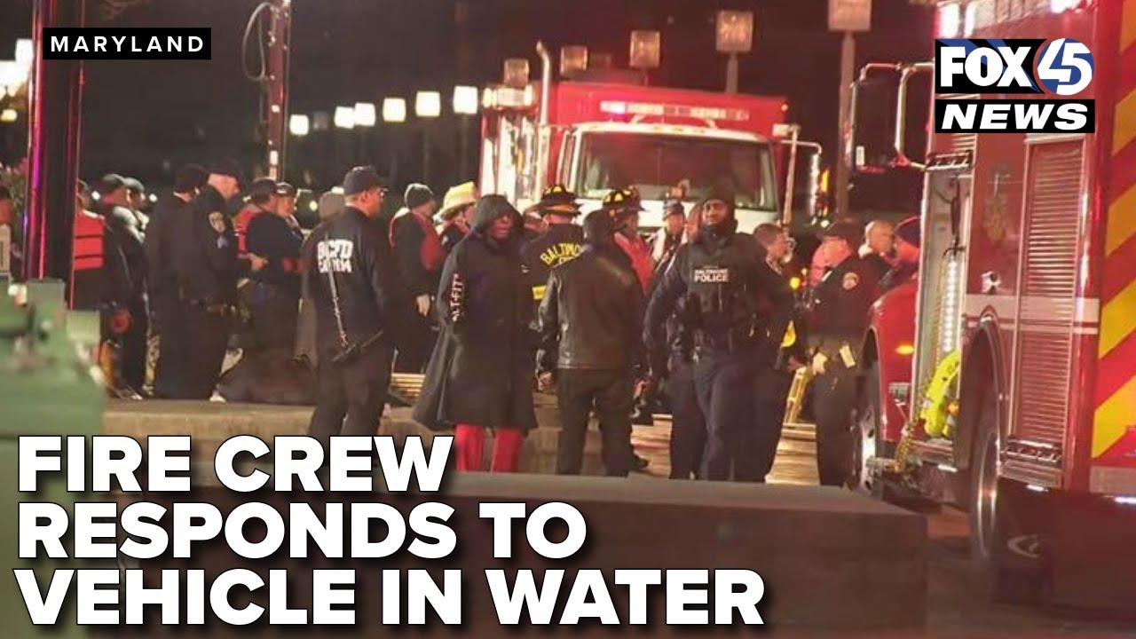 Baltimore City Fire Department responding to vehicle submerged in water
