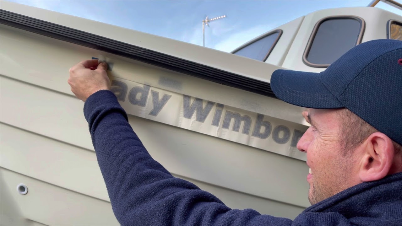 3. Orkney Strikeliner 16+ Naming the boat and adding the decals plus installing a new bilge pump.