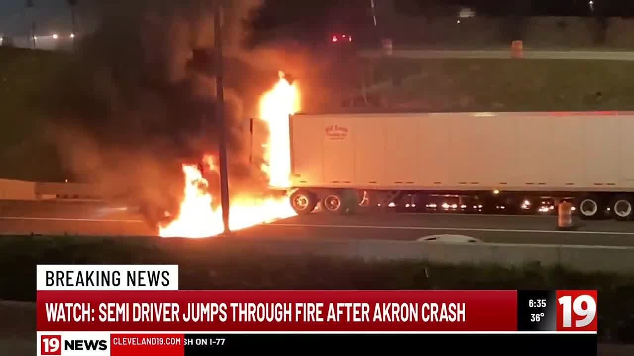 Watch semi driver jump through fire after Akron crash on I-77