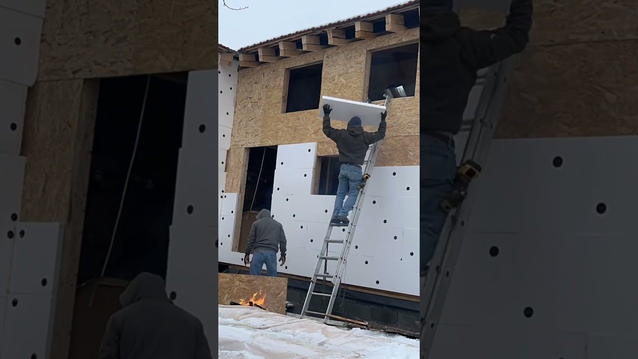 Insulating an OSB wall with foam panels.  #insulation #warm #homesteading #homebuild