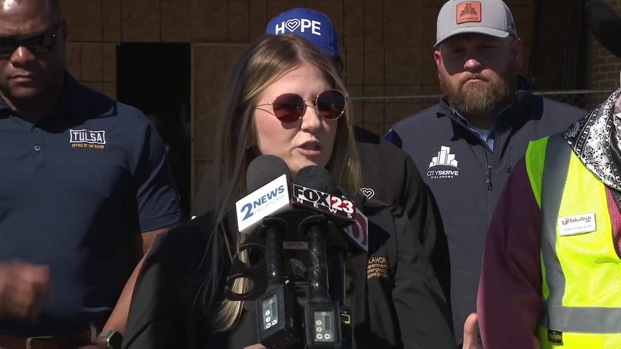 Governor Kevin Stitt, Mayor Monroe Nichols, and other officials discuss storm damage in north Tulsa