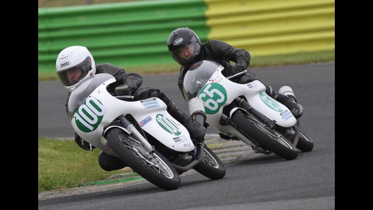 Ducati single racing on board with British Historic Racing