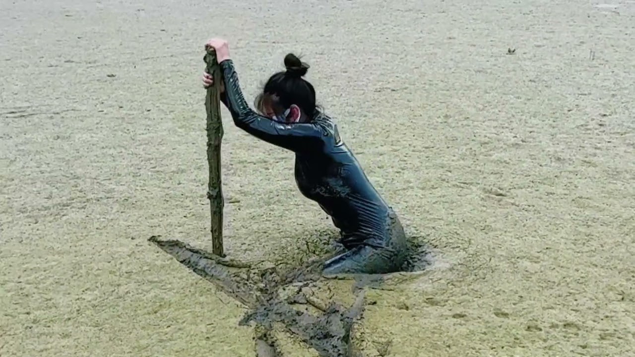 37-lower part  The girl got stuck in quicksand.