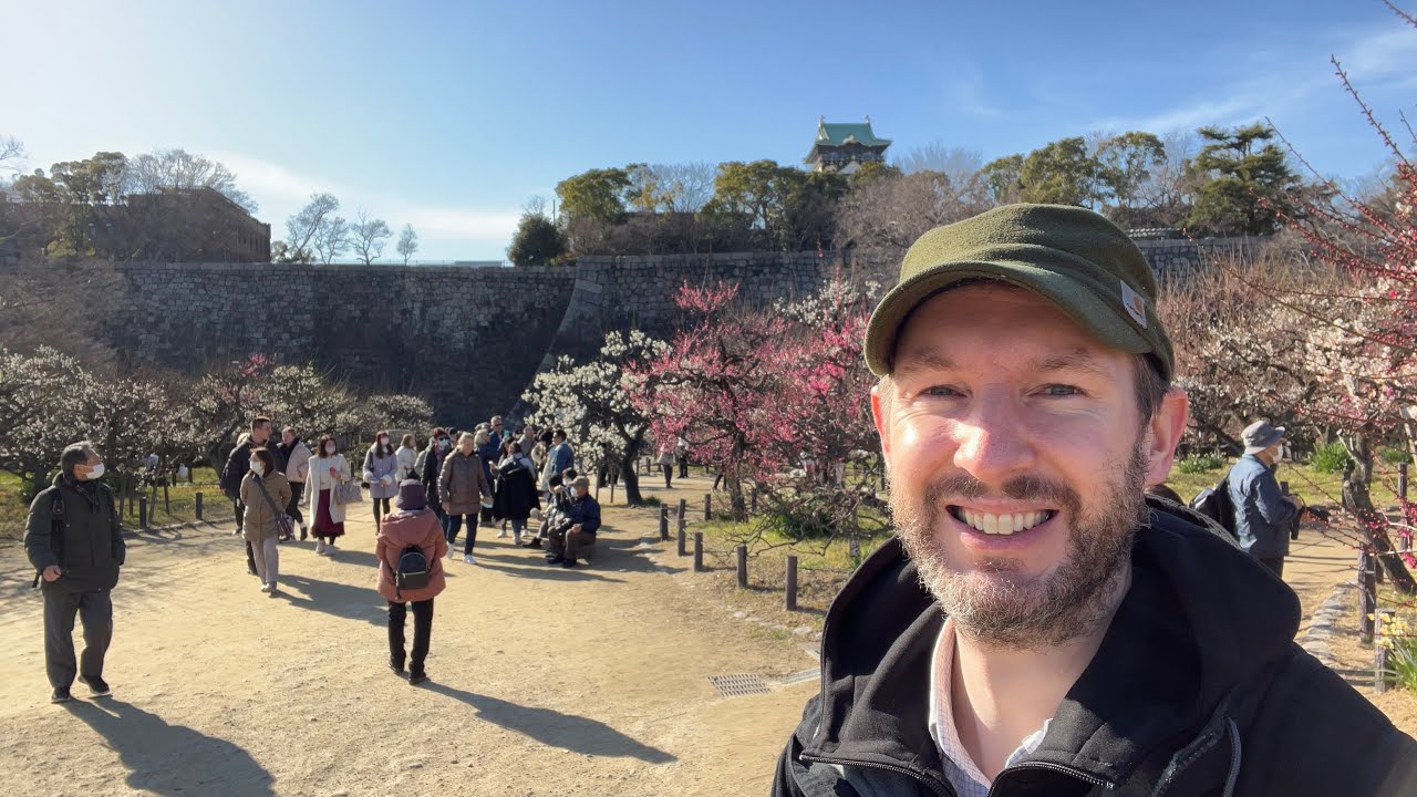 Experience the Stunning Scenery of Plum Blossoms 🌸 at Osaka Castle with a Live Tour from Temmabashi