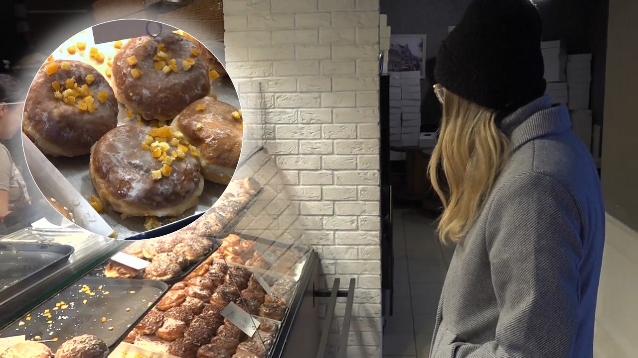 Lines stretched from early morning and the aroma of doughnuts hung in the air. Fat Thursday in Po...