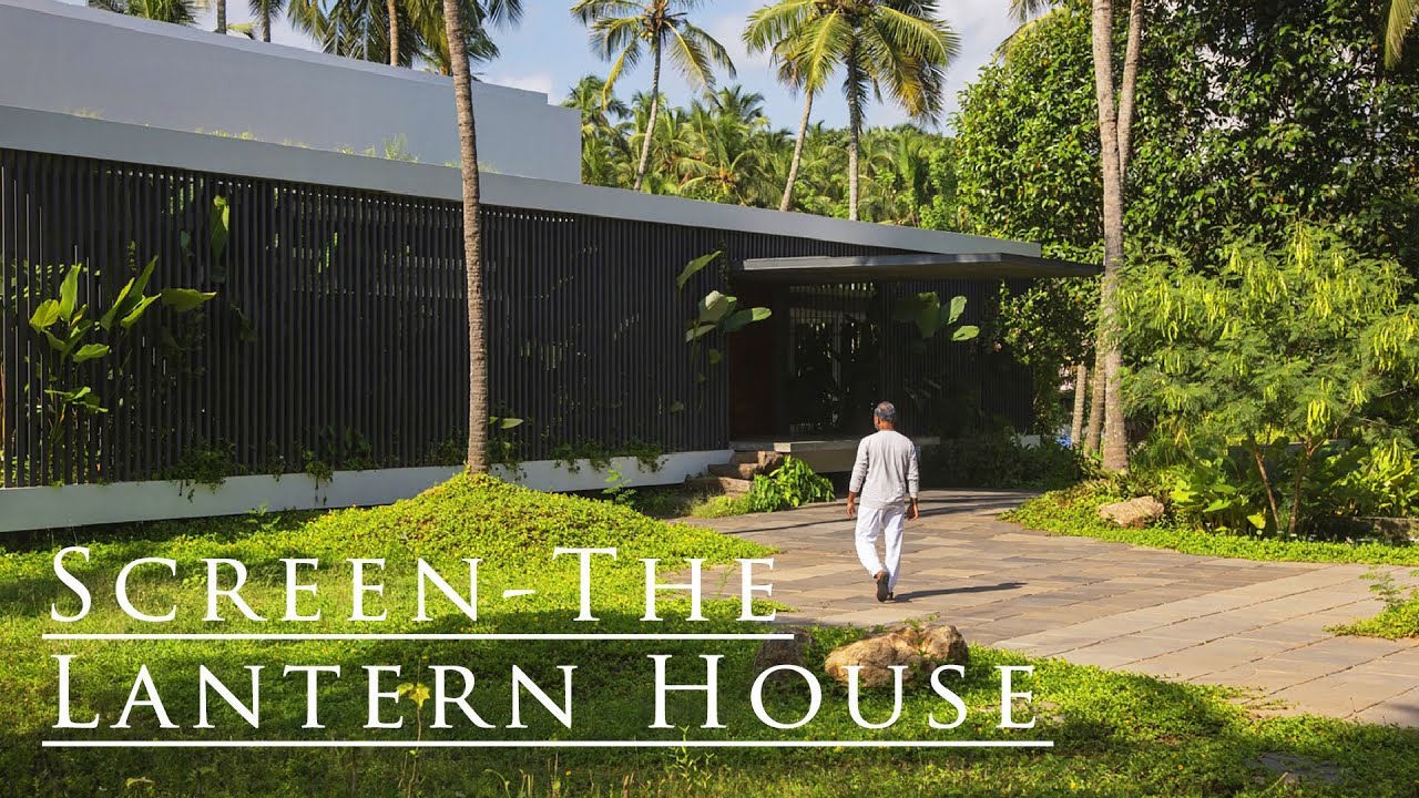 A house immersed in greenery with no clear boundaries. INDIA