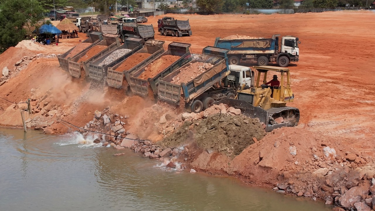 Ultimately Land Filling Operator Dozer Pushing Rocks Vs Dump Truck Dumping Rocks