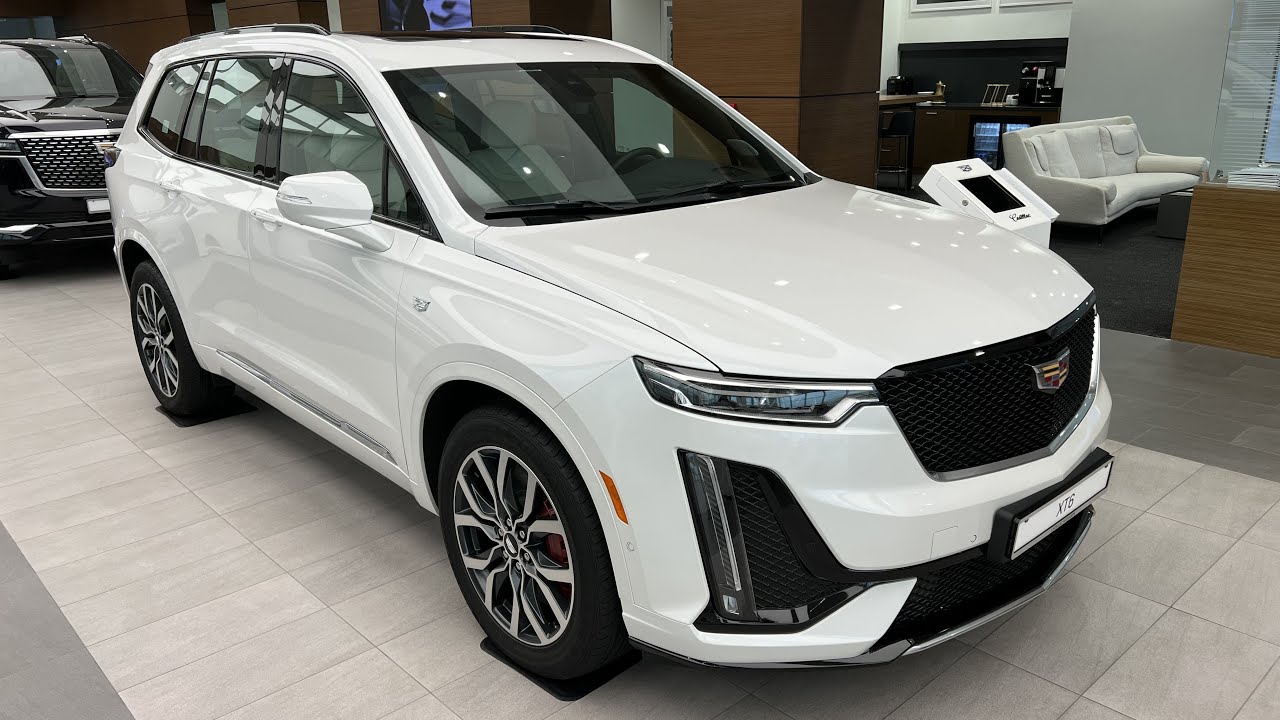 كاديلاك XT6 2022 سبورت محرك 6 سلندر ثلاث صفوف جلد سقف بنوراما دفع رباعي صيانة مجانية وارد الغانم