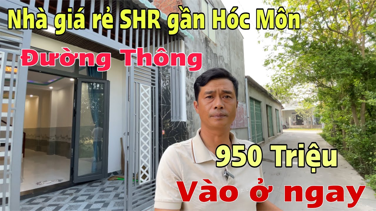 Nhà giá rẻ giáp Hóc Môn 1 trệt 1 lầu Dt 4x13m sổ hồng riêng , mặt tiền kinh doanh 950 Triệu Nhận nhà