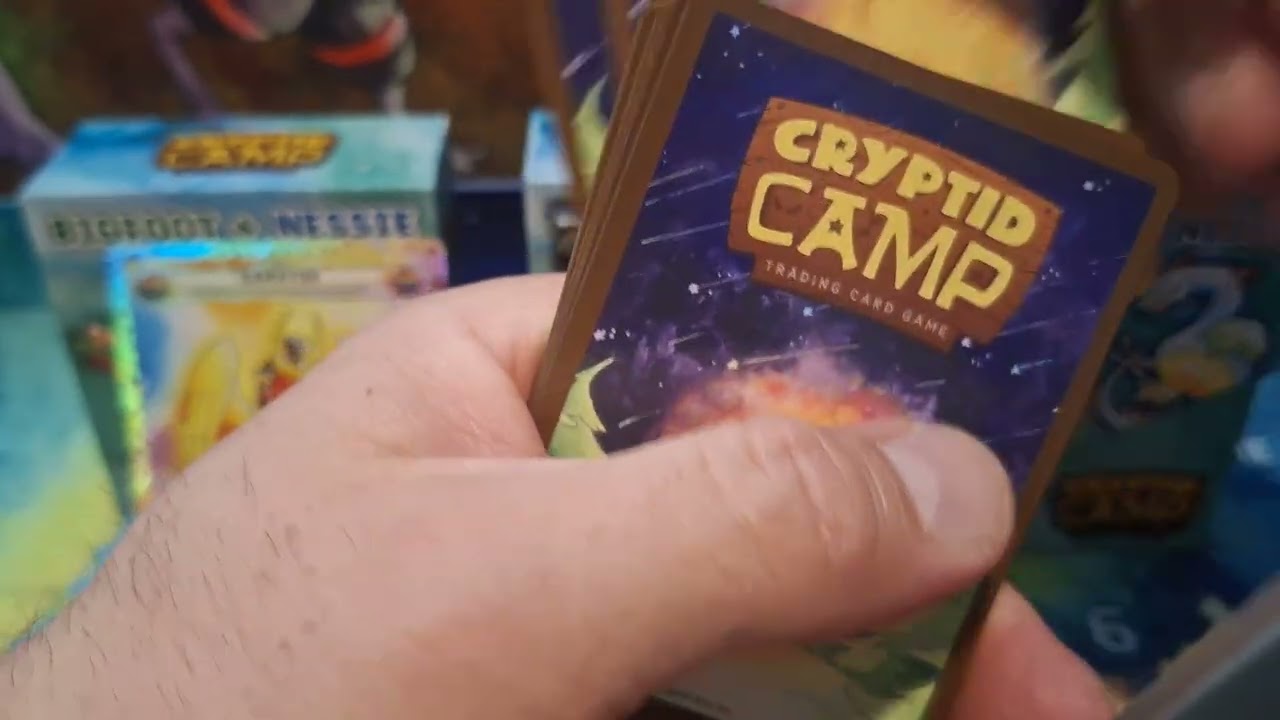 Opening Cryptid Camp deck packs on the serial hunt.