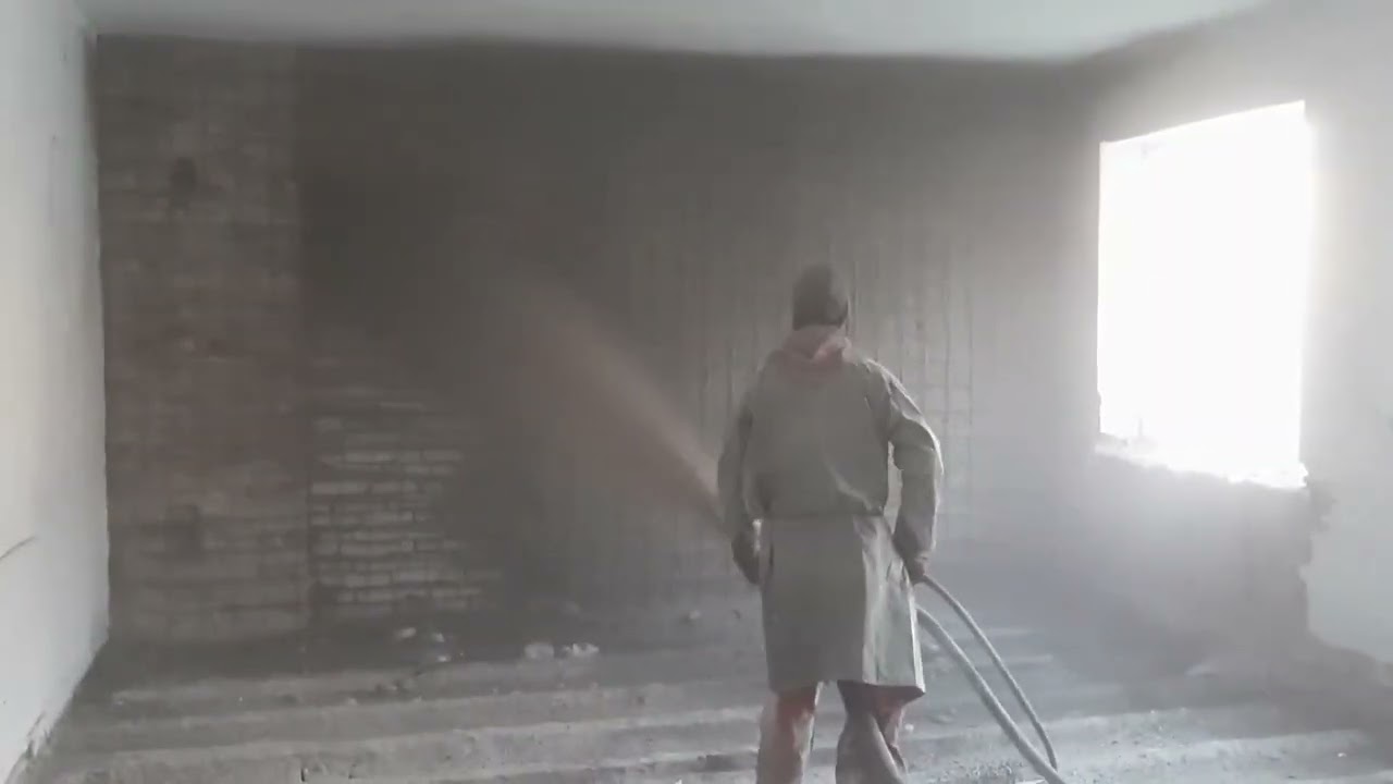 Old brick wall structures, strengthening with wired mesh and shotcrete