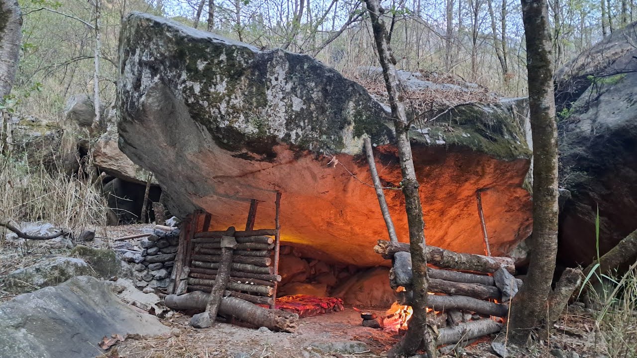 Building Survival Shelter under a Large Rock, solo bushcraft camp