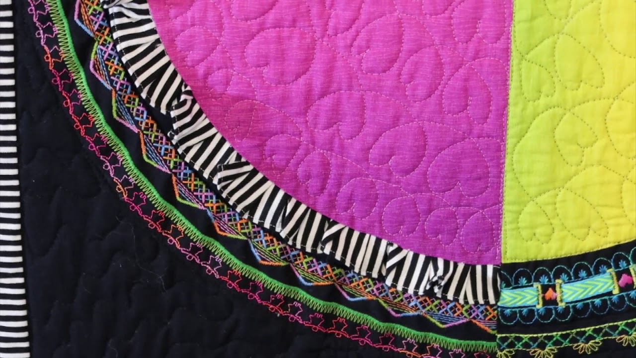 Student Stitching Cosmos Quilt 1