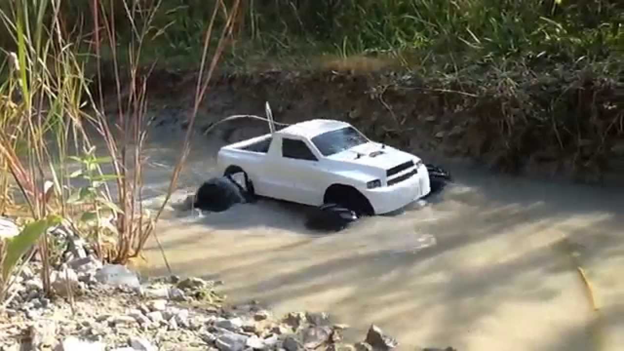 2 RC TAMIYA TRUCKS, 4X4 WATER BOGGING scale run
