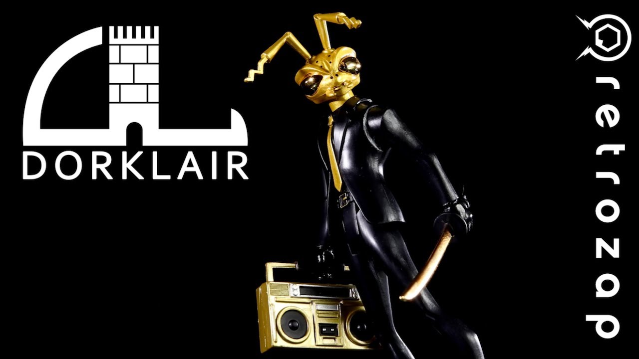 Mezco 5 Points Agent Gomez Review - Mezco Con Booth-in-a-Box Gold Edition - DorkLair