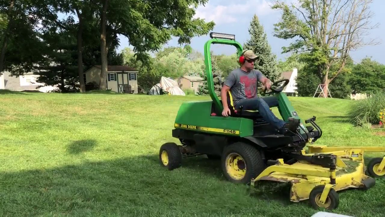 John Deere F1145 Mowing Overgrown Backyard