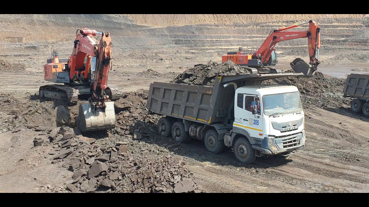 Two Hitachi Zaxis 470H Excavators Loading Coal On Eicher Trucks.