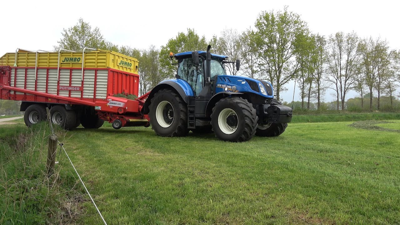 Gras oprapen met een New Holland T7.315 HD en Pöttinger Jumbo 6000 opraapwagen (2022)