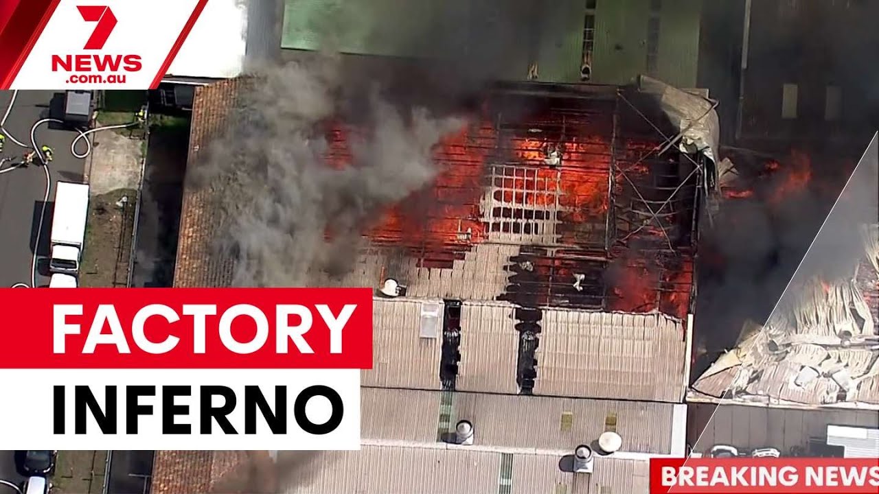 Major factory inferno destroys two buildings in Western Sydney | 7NEWS