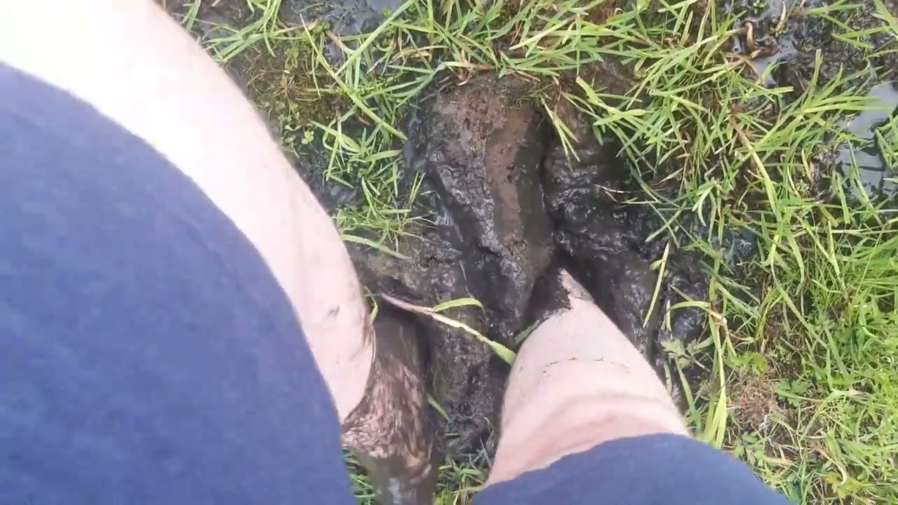 barefoot in slurping dried bog mud