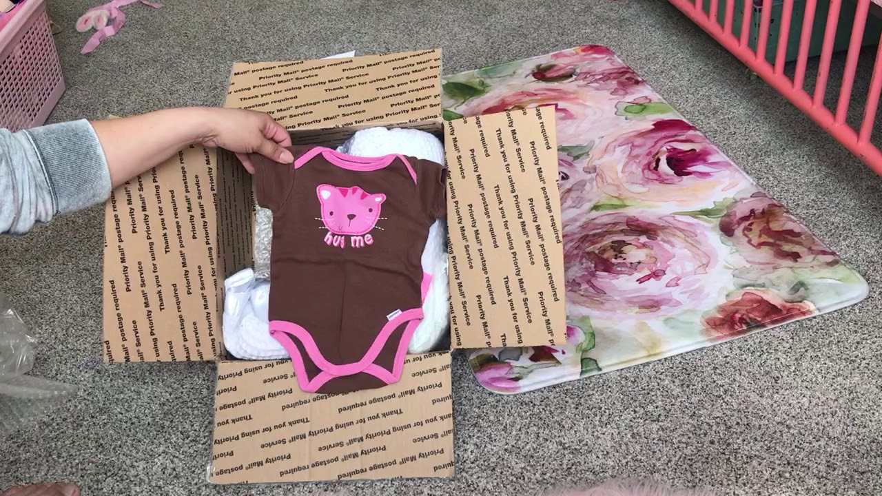 Cuddle baby box opening...bought from another mommy.  So exciting
