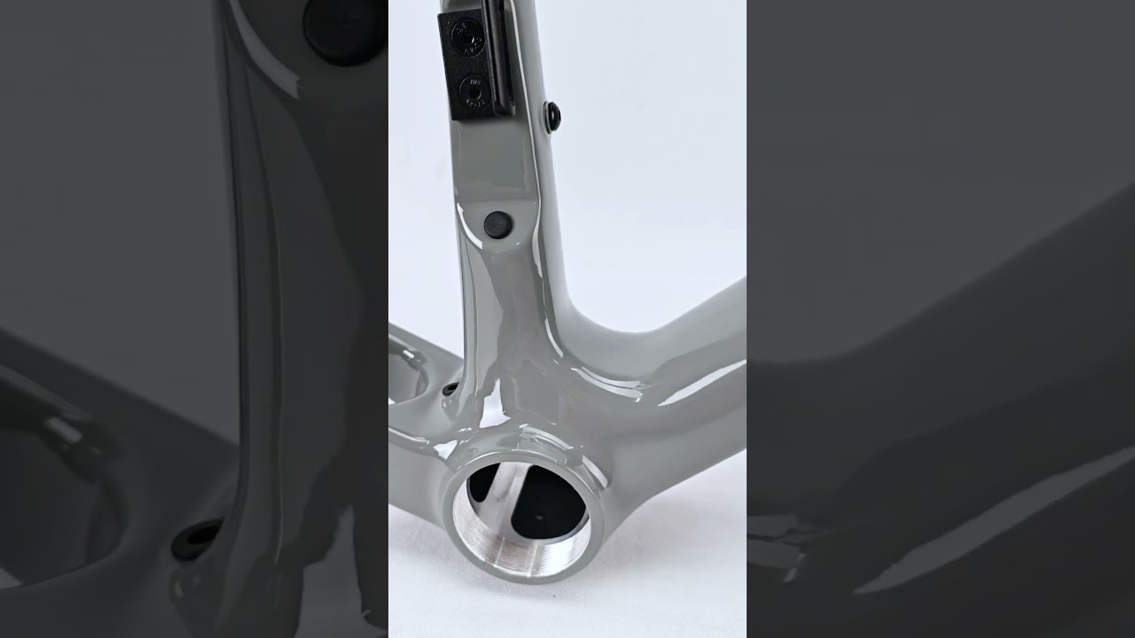 ICAN gray road bike frame Flyee with a rainbow logo.#icancycling #flyee