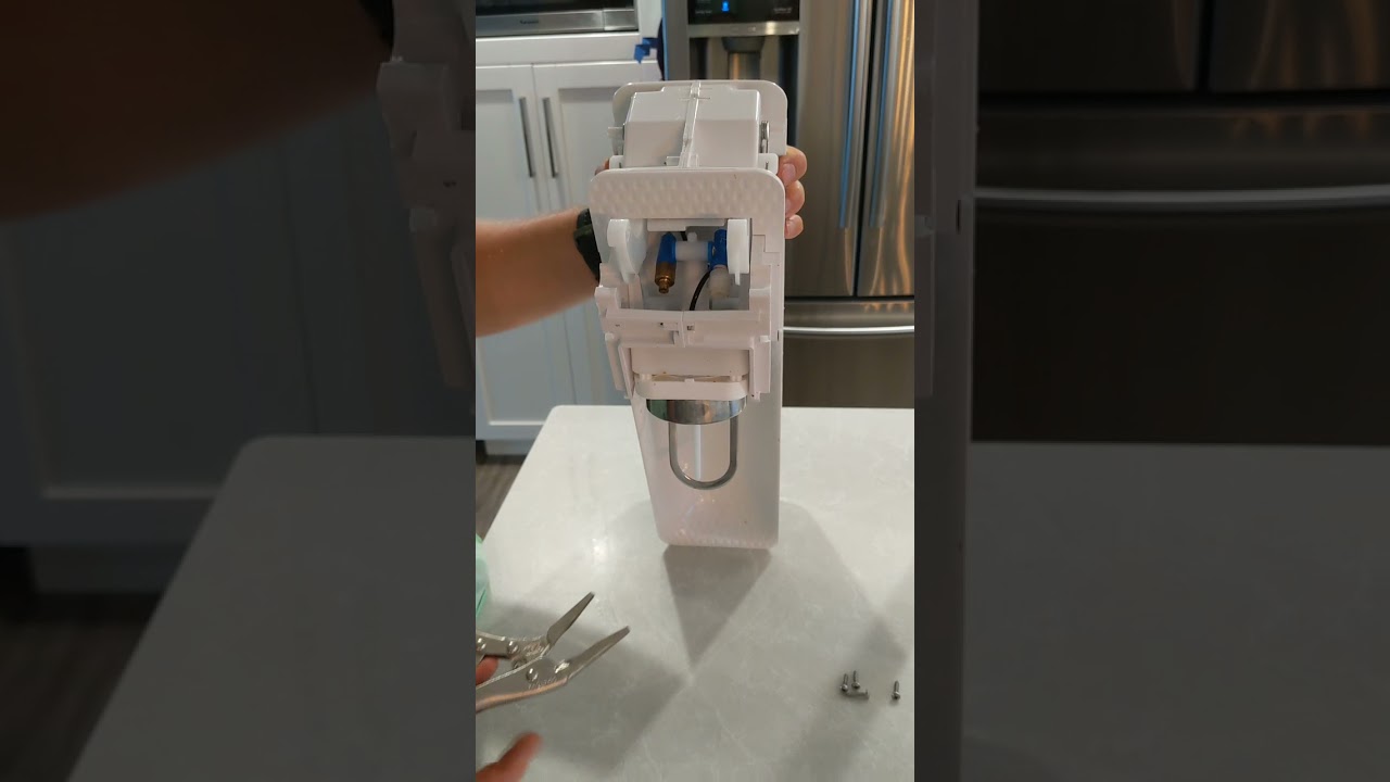 Disassemble soda stream pressure relief valve.