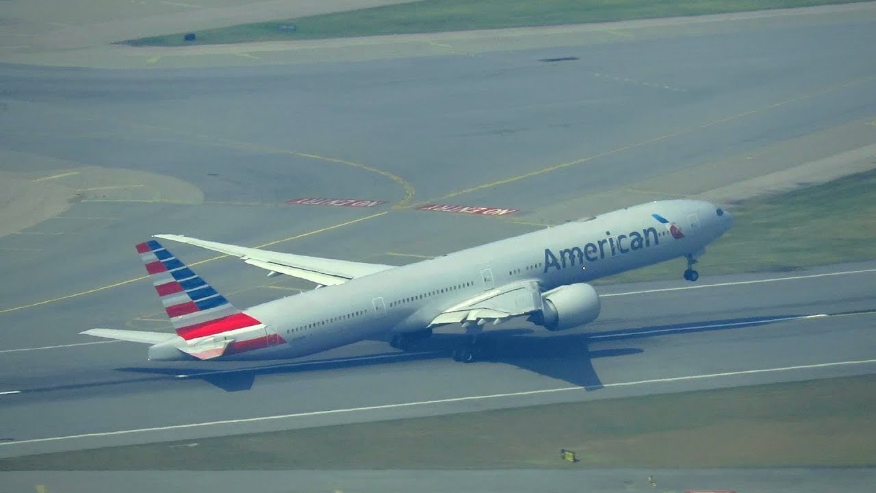 From ABOVE! American Airlines Boeing 777-300ER Takeoff from Hong Kong Airport (HKG) | N729AN