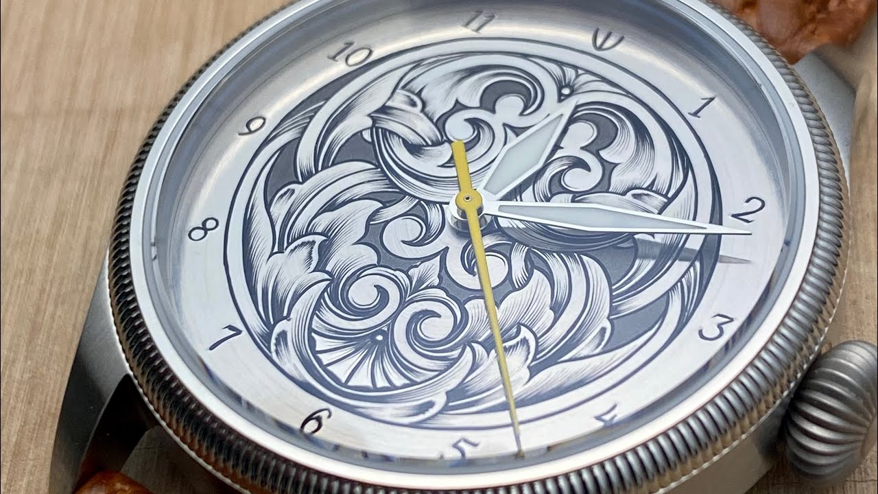 Making a watch dial and hand engraving it.