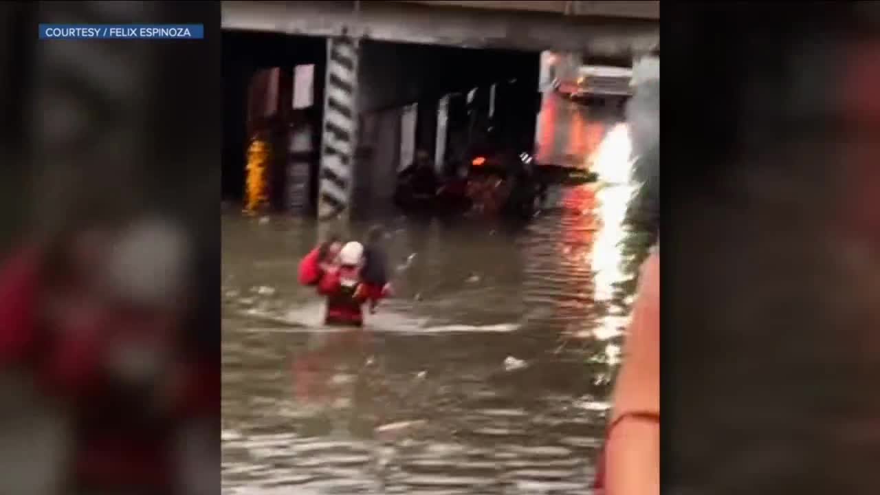 Video: Denver firefighter rescues 2 children from flooding