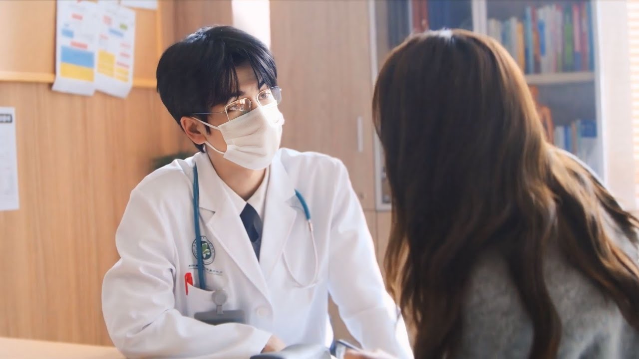 A handsome doctor wears a mask to stop girls chasing him when a patient sees his face she's stunned