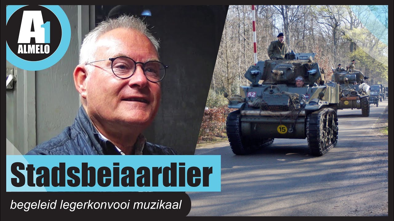Stadsbeiaardier begeleid legerkonvooi muzikaal