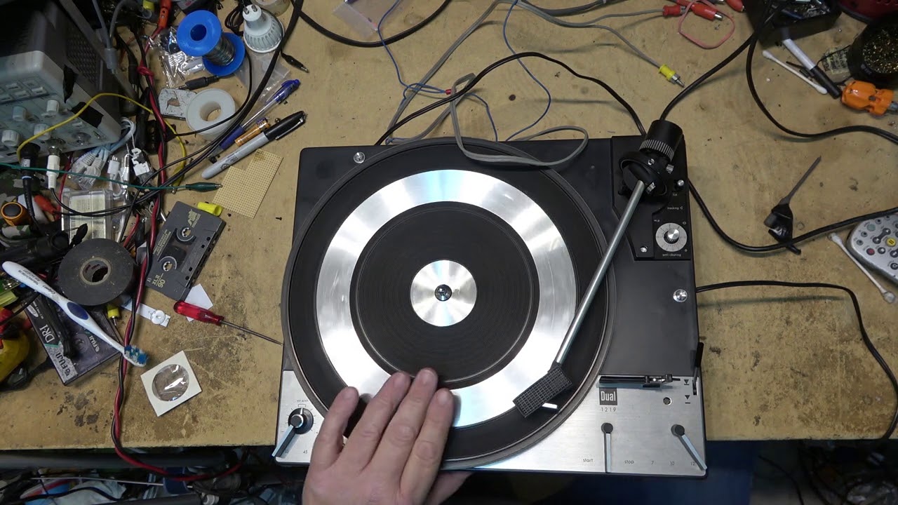 Dual 1219 mechanical repair.  The tone arm was jamming on automatic cycle