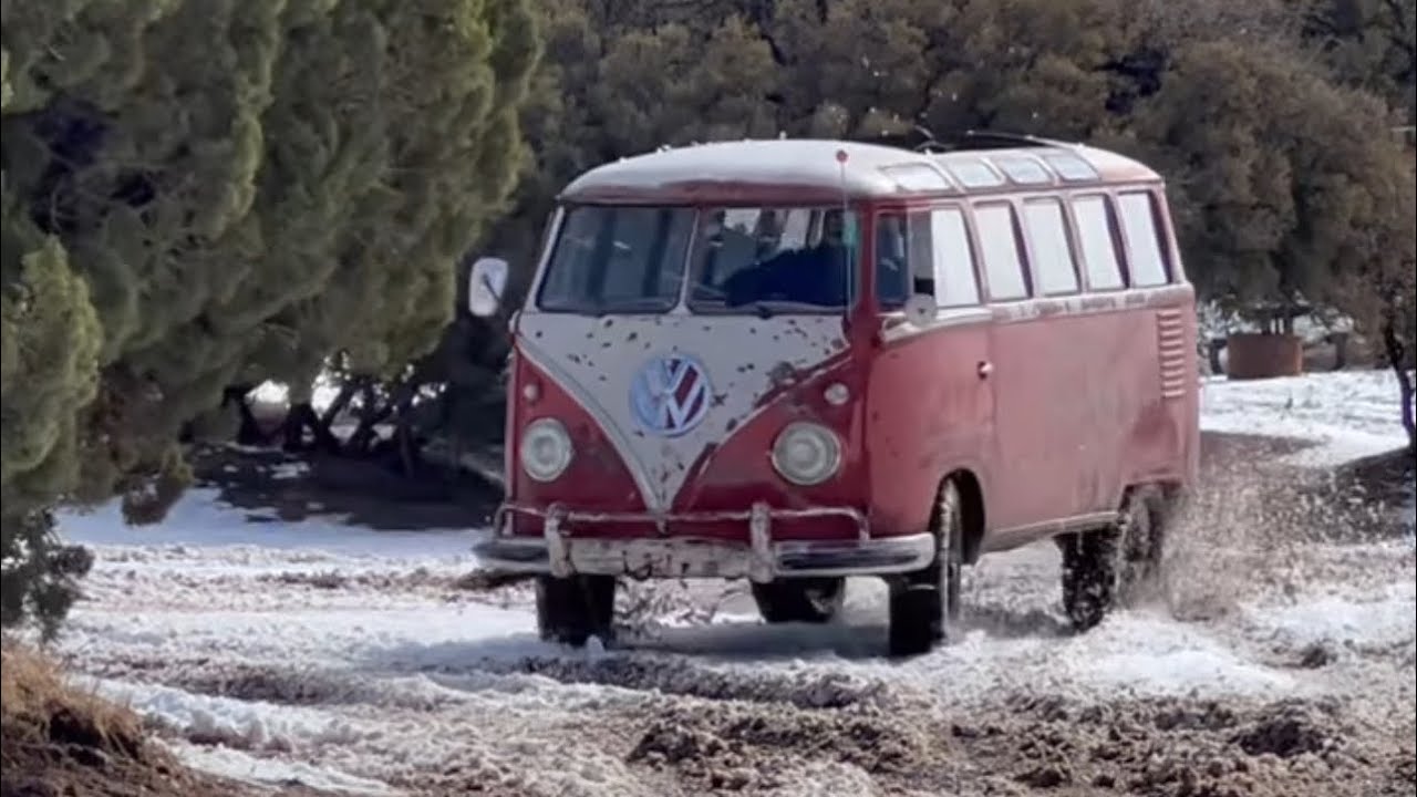 Off-roading a 23 window VW Bus In the snow and mud.